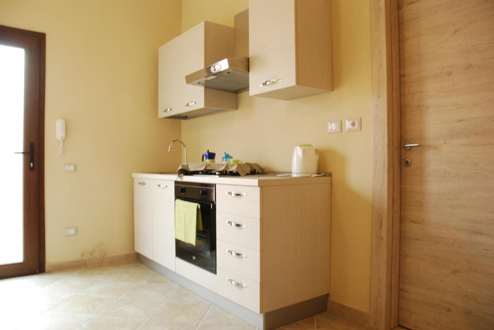 Alba Sarda Residence Iglesias Habitación foto