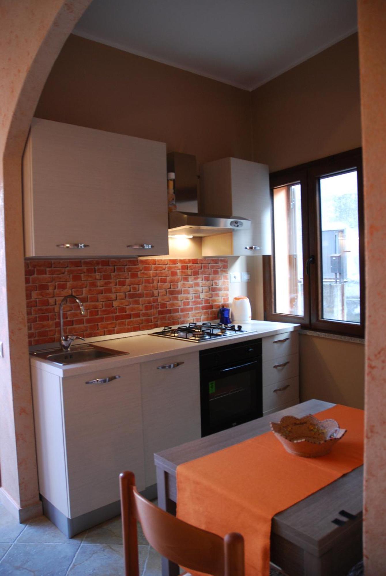 Alba Sarda Residence Iglesias Habitación foto