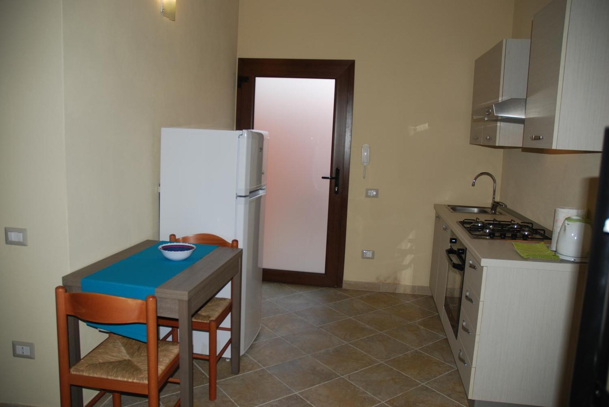Alba Sarda Residence Iglesias Habitación foto