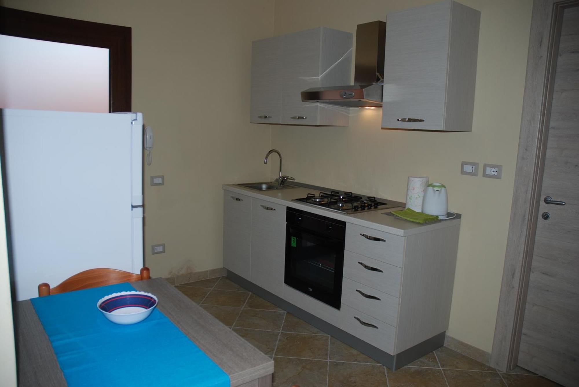 Alba Sarda Residence Iglesias Habitación foto